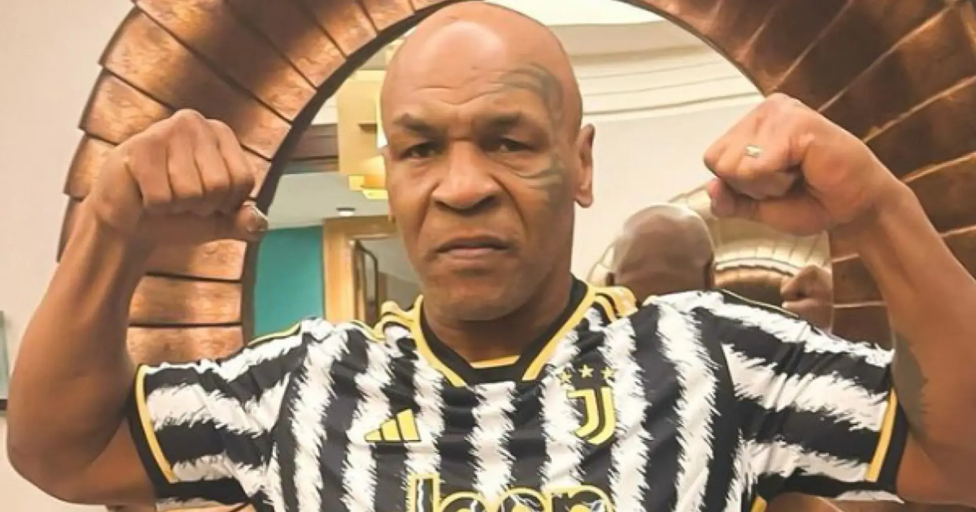   'Training gonna get a whole lot tougher': Mike Tyson poses in Juventus shirt