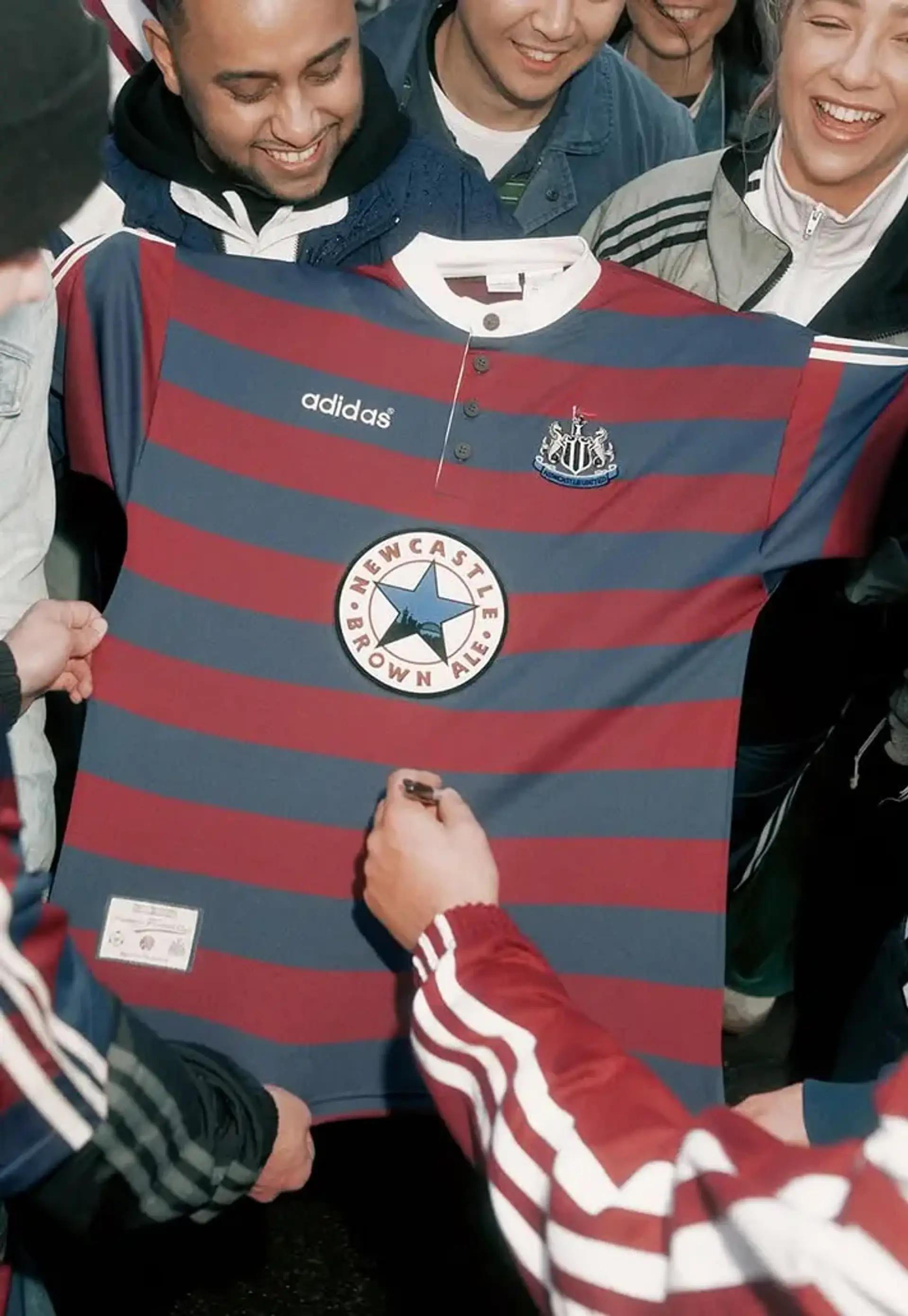 Newcastle United players stun in iconic '95 retro kit as Adidas