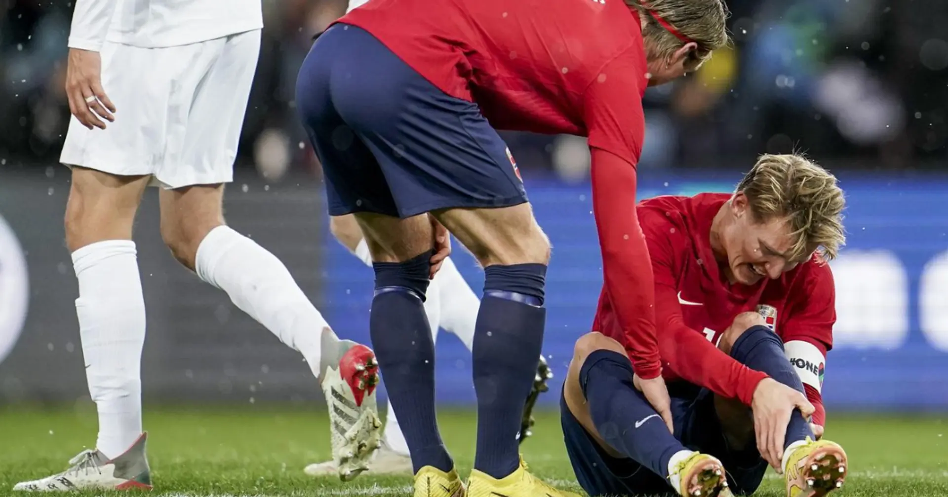 Martin Odegaard spotted limping after taking hit to ankle 